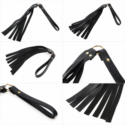 Black faux leather tassel flogger with wrist loop handle and multiple soft tassels.