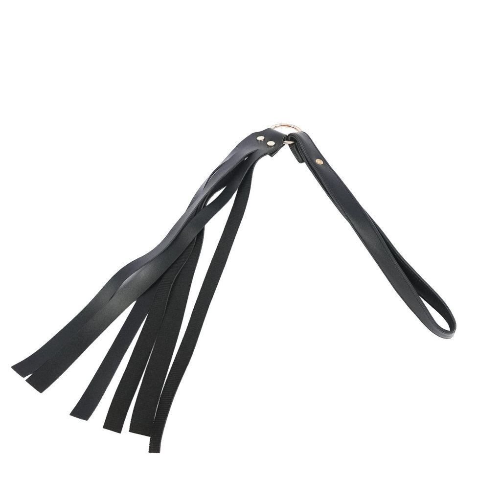 Premium black faux leather tassel flogger with wrist loop handle, soft tassels, and durable metal hardware.